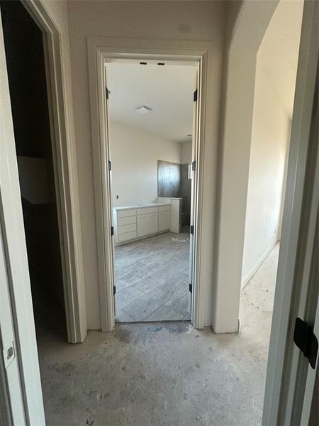 Utility room conveniently connects to primary closet