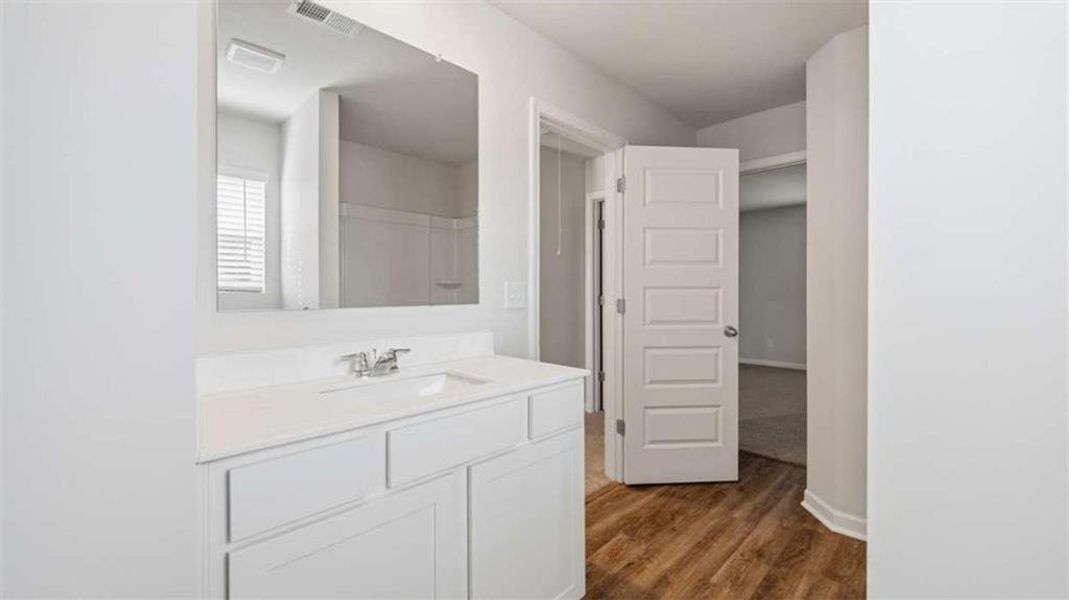 Furnished interior view inside a new home in Oakchase at Hampton, Hampton (Image 8).