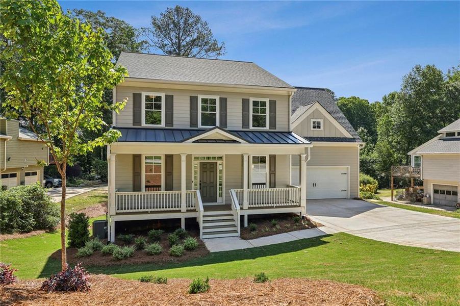 Front exterior of a new home in , Smyrna, GA, highlighting curb appeal (Image 2). Front exterior of a new home in , Smyrna, GA, highlighting curb appeal (Image 2).