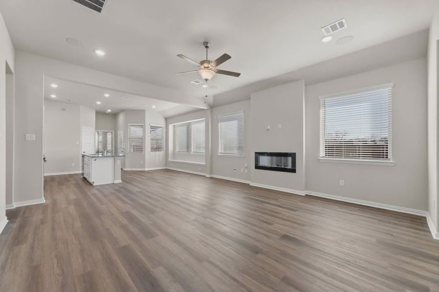 Representative unfurnished interior of a home built from the Charleston by Chesmar Homes in Avondale, Fate (Image 6).