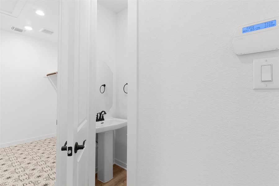 Half bath with baseboards