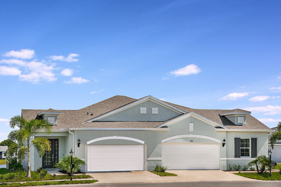 Front exterior of a new home in Kings Gate, Punta Gorda, FL, highlighting curb appeal (Image 18).