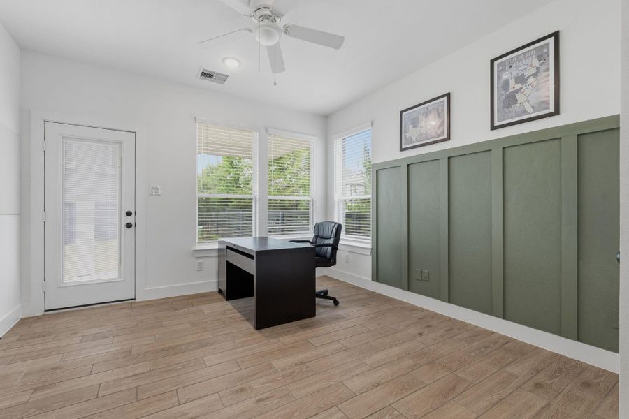 Second of two secondary bedrooms or can be used as flex room with access to back patio.