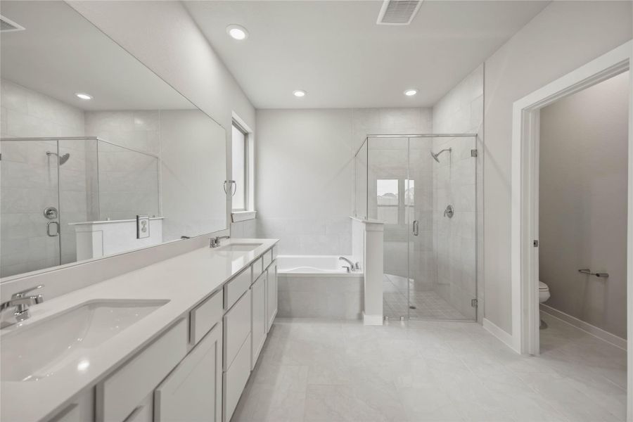 Furnished interior view inside a new home in Sunterra 40, Katy (Image 6).