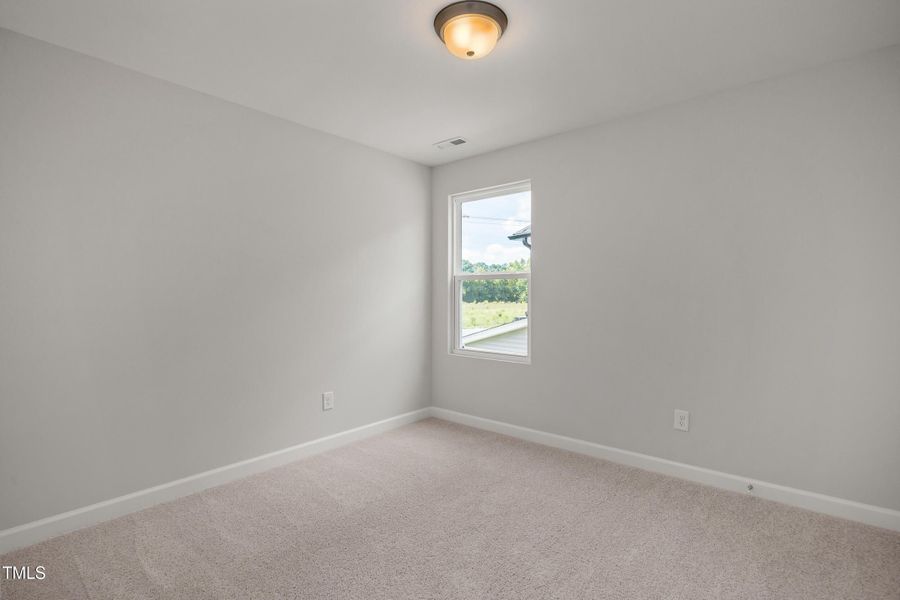 Spacious, unfurnished interior of a new home in Woodland Crossing, Zebulon (Image 19).