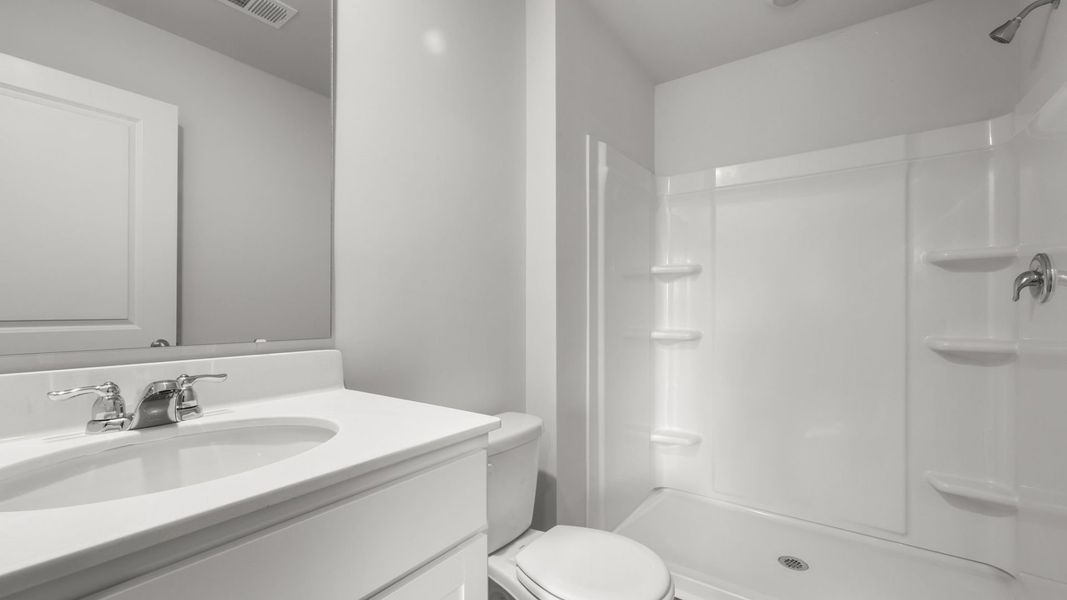 Representative furnished interior of a home built from the SULLIVAN by D.R. Horton in Evergreen, Holly Hill (Image 10).