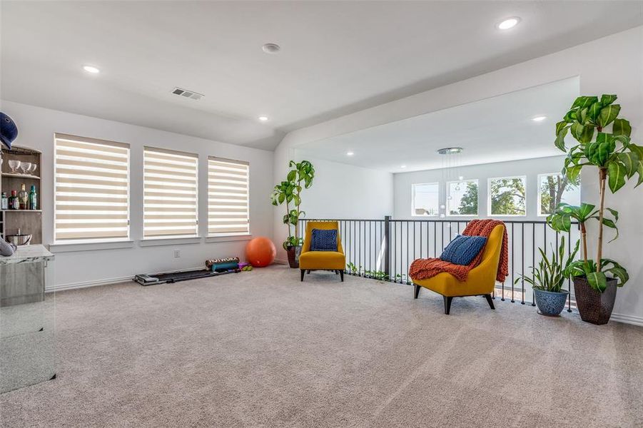 The oversized game room is the ultimate entertaining space! Featuring plush carpet, luxury blinds, and recessed lighting, it’s perfect for game nights, movie marathons, or a cozy hangout with family and friends. The oversized game room is the ultimate entertaining space! Featuring plush carpet, luxury blinds, and recessed lighting, it’s perfect for game nights, movie marathons, or a cozy hangout with family and friends.