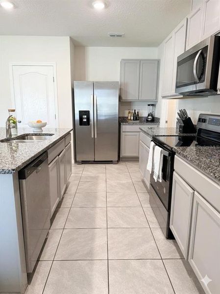 Furnished interior view inside a new home in , Kissimmee (Image 5).