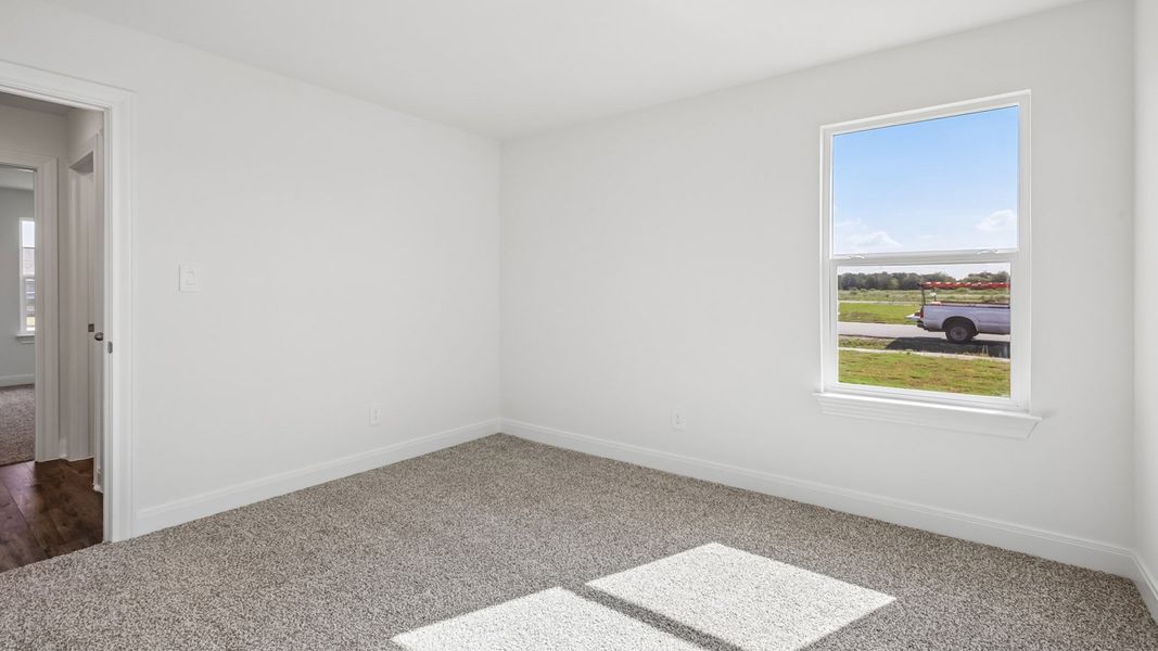 Spacious, unfurnished interior of a new home in Railhead, Cedar Creek (Image 26).