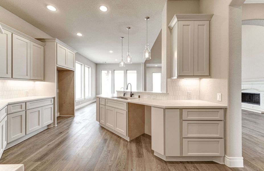 Furnished interior view inside a new home in Bridgeland 60′, Cypress (Image 6).