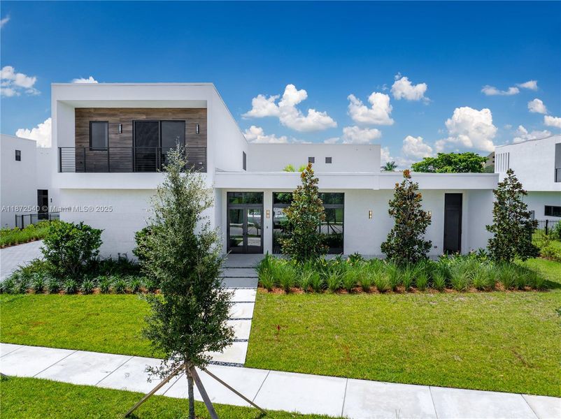 Front exterior of a new home in , Weston, FL, highlighting curb appeal (Image 29).