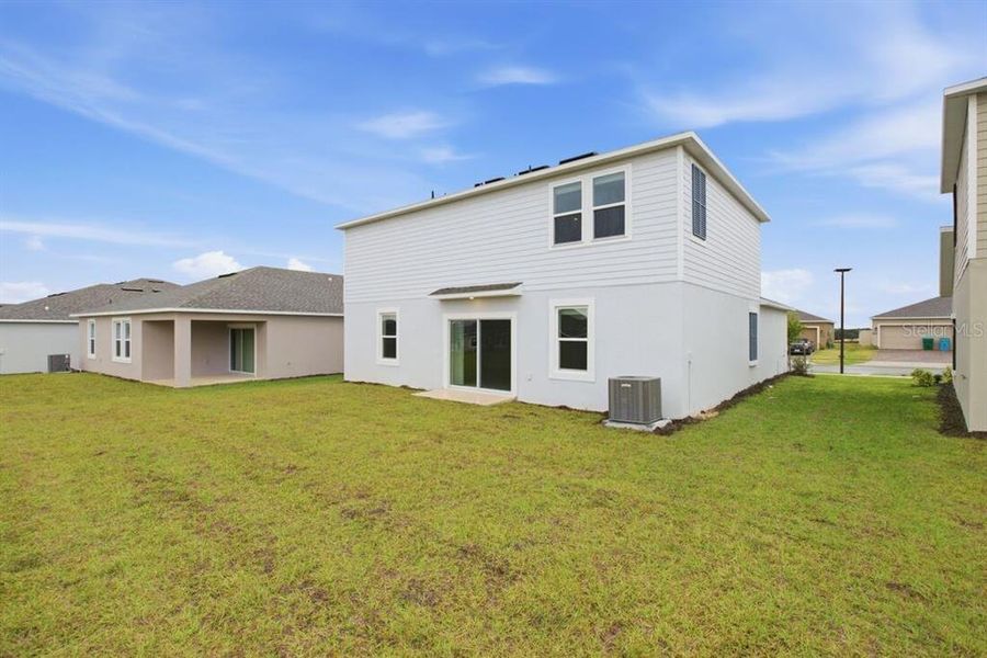 Exterior details and patio area of a home in Waterstone, Groveland (Image 3).