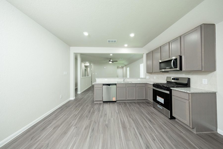 Furnished interior view inside a new home in Ridgeland Hills, Willis (Image 7).