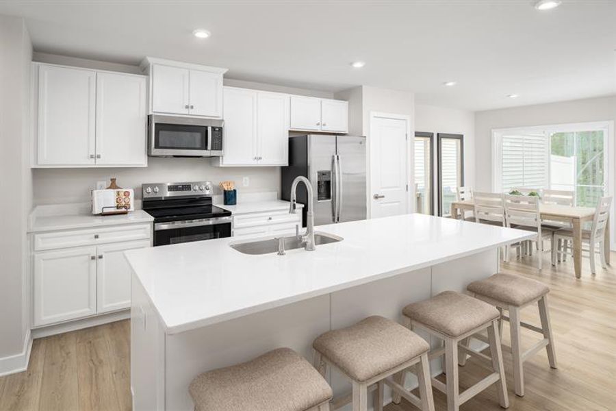 Furnished interior in a model home at Hope Pointe Townhomes in North Myrtle Beach (Image 11).