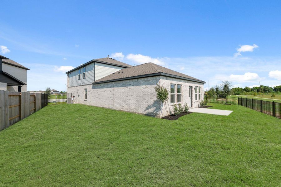 Front exterior of a new home in River Ranch Trails, Dayton, TX, highlighting curb appeal (Image 16). Front exterior of a new home in River Ranch Trails, Dayton, TX, highlighting curb appeal (Image 16).