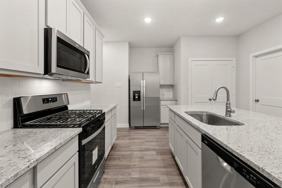 Furnished interior view inside a new home in Creekland Village at Bridgeland, Cypress (Image 3). Furnished interior view inside a new home in Creekland Village at Bridgeland, Cypress (Image 3).