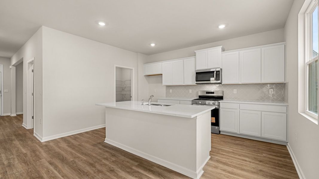 Representative furnished interior of a home built from the Galen by D.R. Horton in Poplar Preserve, Newnan (Image 6).