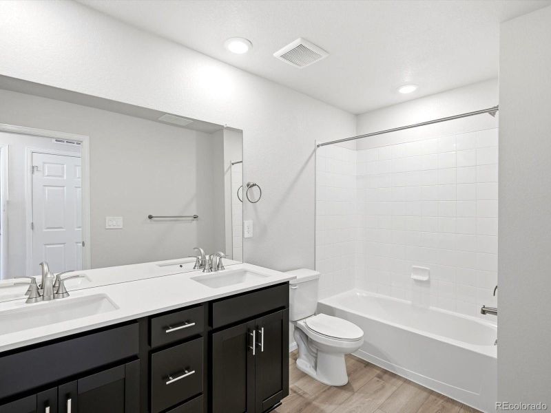 Furnished interior view inside a new home in Three Hills, Morrison (Image 7).