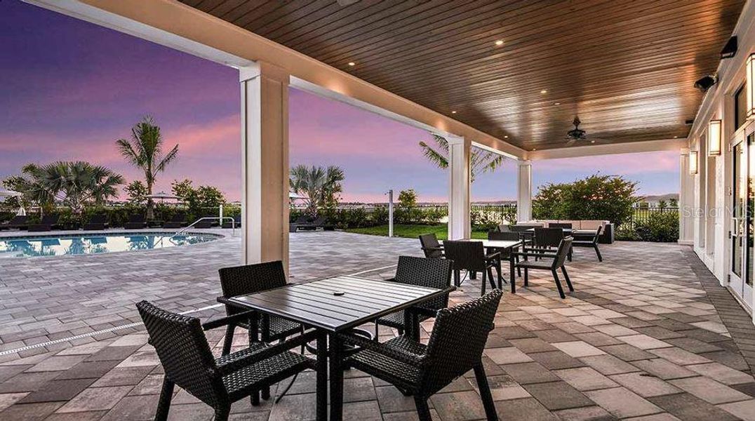Exterior details and patio area of a home in The Cove at West Port, Port Charlotte (Image 4). Exterior details and patio area of a home in The Cove at West Port, Port Charlotte (Image 4).