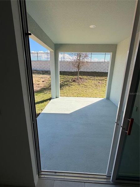 Exterior details and patio area of a home in Hodges Reserve, Howey-in-the-Hills (Image 2).