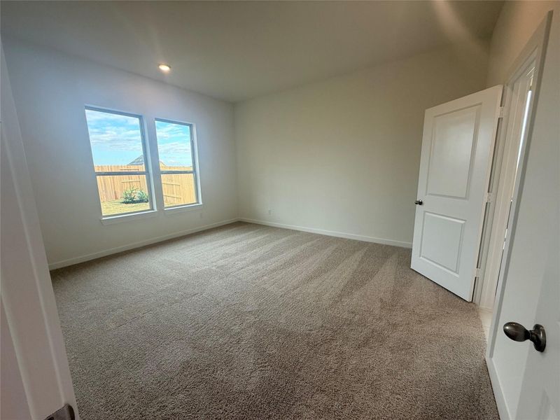 Oversized Main Bedroom nestled in the rear of the home. Oversized Main Bedroom nestled in the rear of the home.
