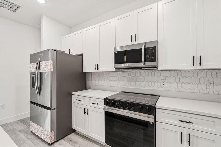 Furnished interior view inside a new home in , North Port (Image 14).