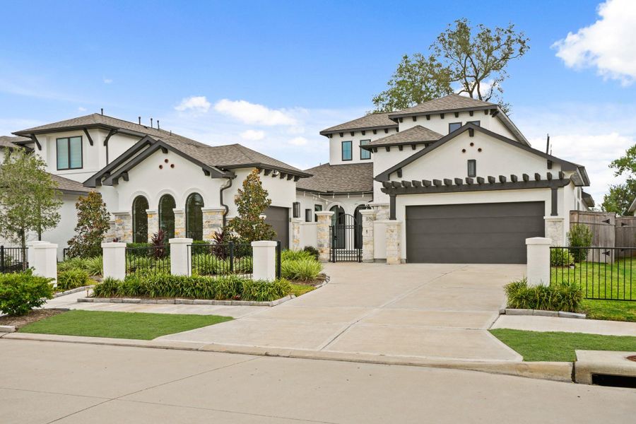Front exterior of a new home in Sienna 55' - Valencia, Missouri City, TX, highlighting curb appeal (Image 2). Front exterior of a new home in Sienna 55' - Valencia, Missouri City, TX, highlighting curb appeal (Image 2).