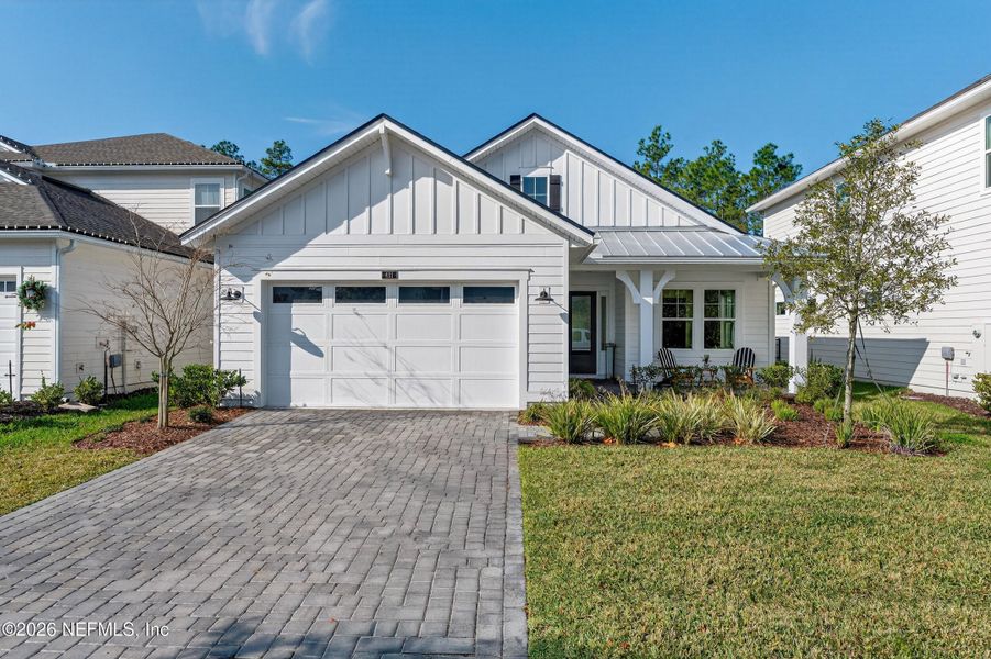 Front exterior of a new home in , Ponte Vedra, FL, highlighting curb appeal (Image 23).