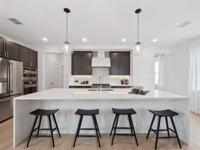 Gourmet island kitchen (*Photo not of actual home and used for illustration purposes only.)