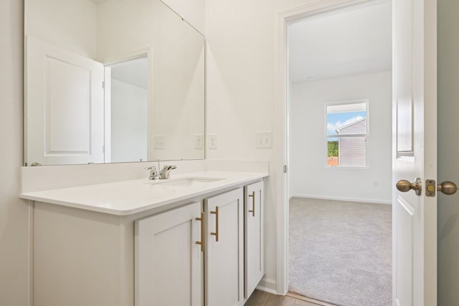 Representative furnished interior of a home built from the Grove by Ashton Woods in Middleton Farms, Middlesex (Image 11).