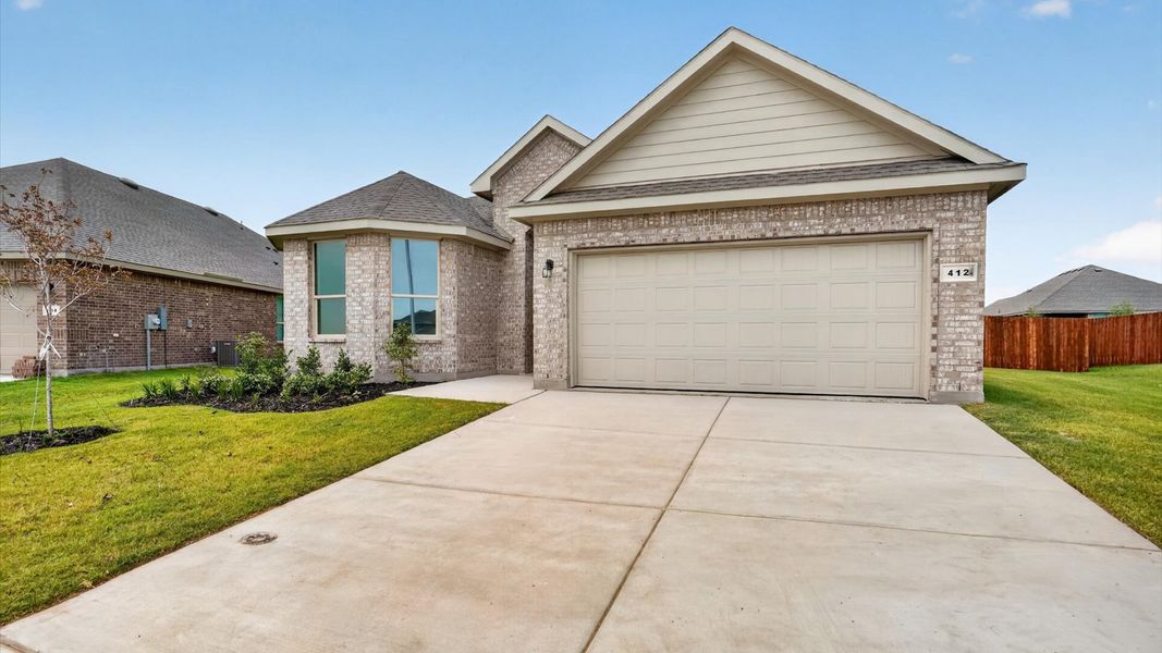 Front exterior of a new home in Saratoga, Granbury, TX, highlighting curb appeal (Image 15).