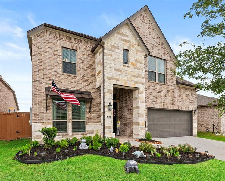 Front exterior of a home in the Lago Mar – 50' community, located in Texas City, TX (Image 8). Front exterior of a home in the Lago Mar – 50' community, located in Texas City, TX (Image 8).