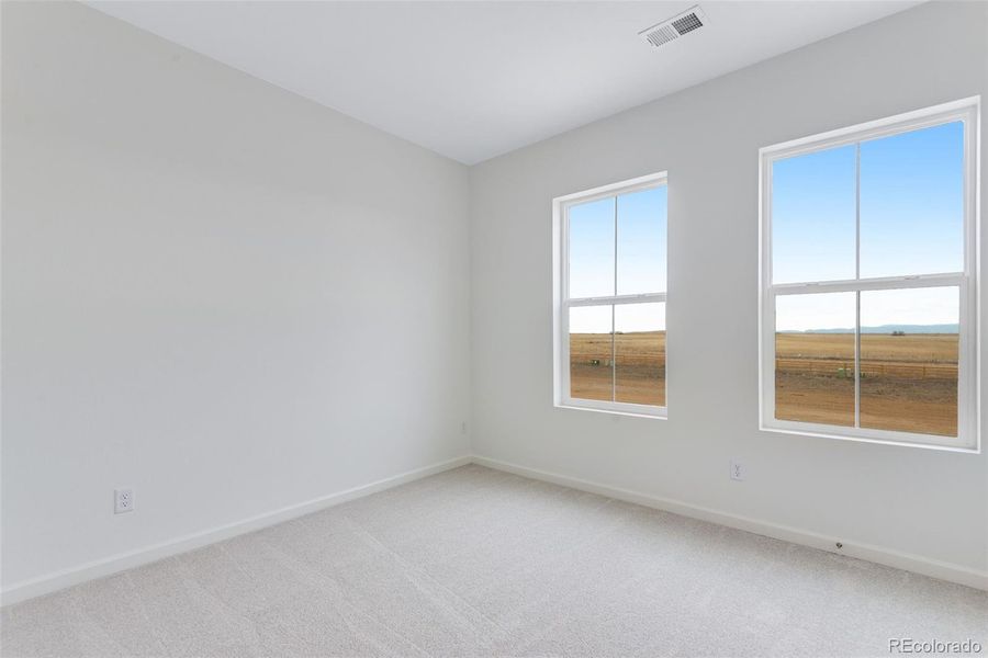 Spacious, unfurnished interior of a new home in Reunion, Commerce City (Image 35).