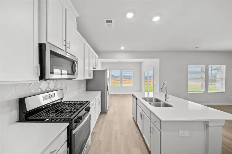 Furnished interior view inside a new home in The Farm at Wells Creek - Heritage Collection, Gray Court (Image 8).