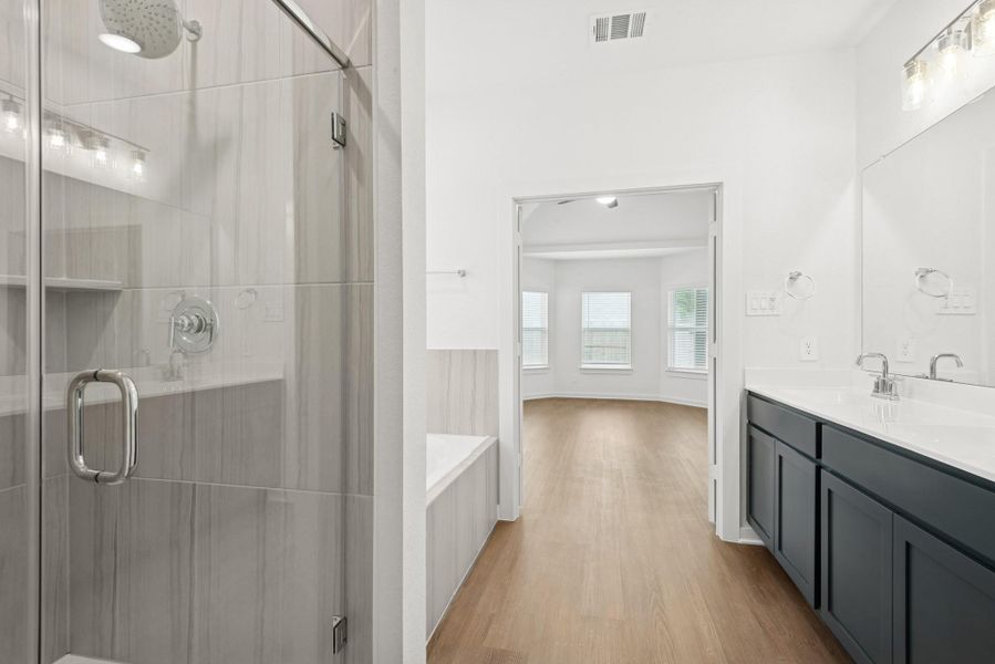 Furnished interior view inside a new home in Lone Star Landing, Montgomery (Image 8).