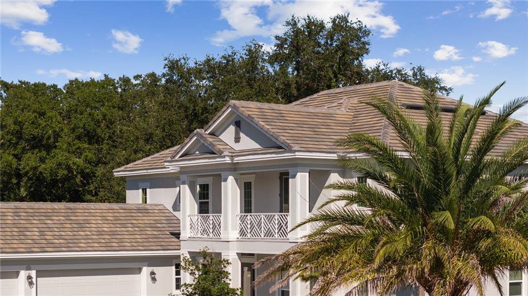 Front exterior of a new home in Fire Creek, Gotha, FL, highlighting curb appeal (Image 1). Front exterior of a new home in Fire Creek, Gotha, FL, highlighting curb appeal (Image 1).