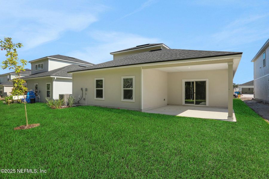 Exterior details and patio area of a home in Bellbrooke, Jacksonville (Image 2). Exterior details and patio area of a home in Bellbrooke, Jacksonville (Image 2).