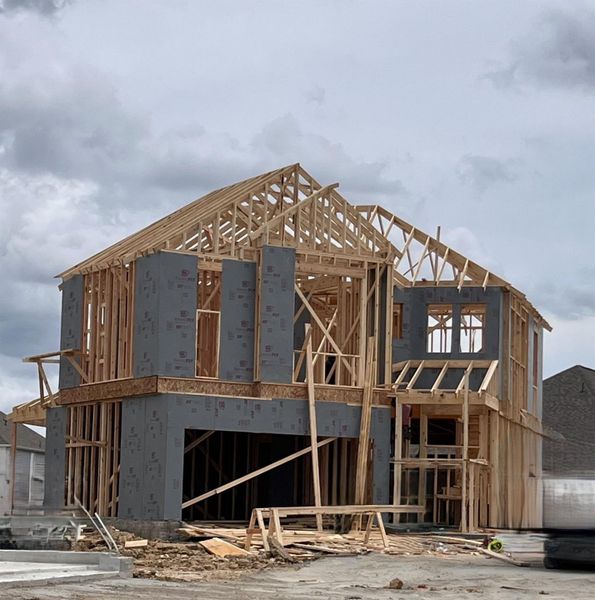 Front exterior of a new home in Bridgeland, Cypress, TX, highlighting curb appeal (Image 21). Front exterior of a new home in Bridgeland, Cypress, TX, highlighting curb appeal (Image 21).