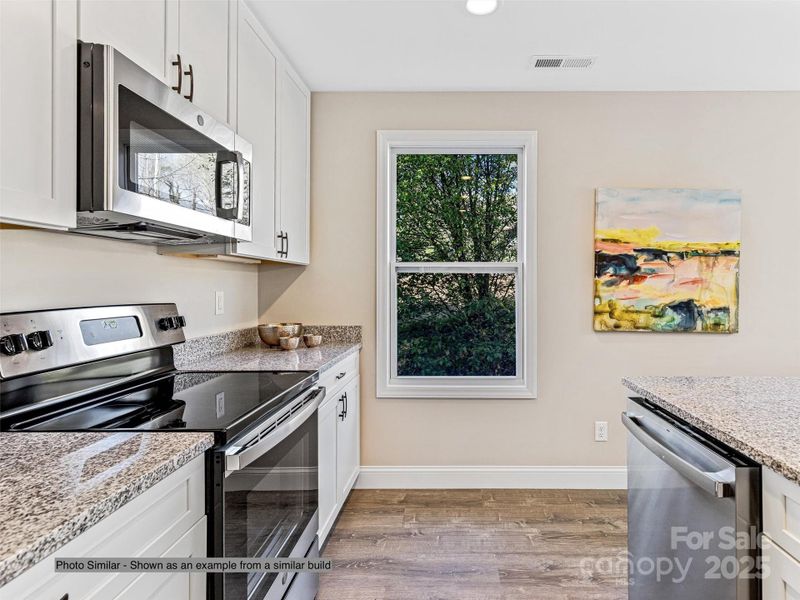 Furnished interior view inside a new home in , Candler (Image 4).