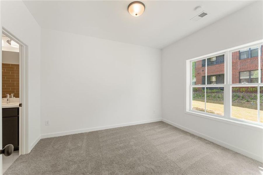 Spacious, unfurnished interior of a new home in Townes at South Main, Kennesaw (Image 15).