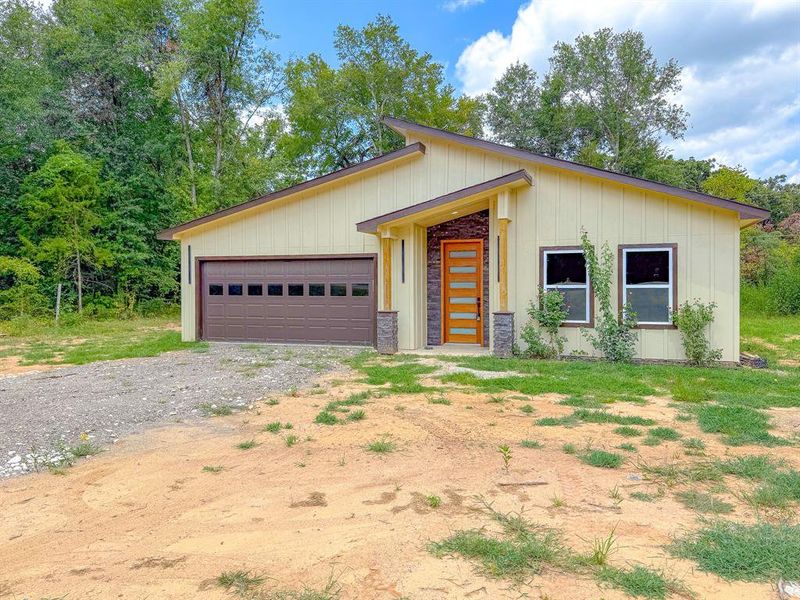 Front exterior of a new home in , Fairfield, TX, highlighting curb appeal (Image 12).