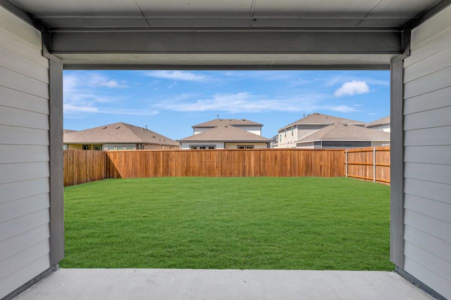 Exterior details and patio area of a home in The Meadows, Denton (Image 18).