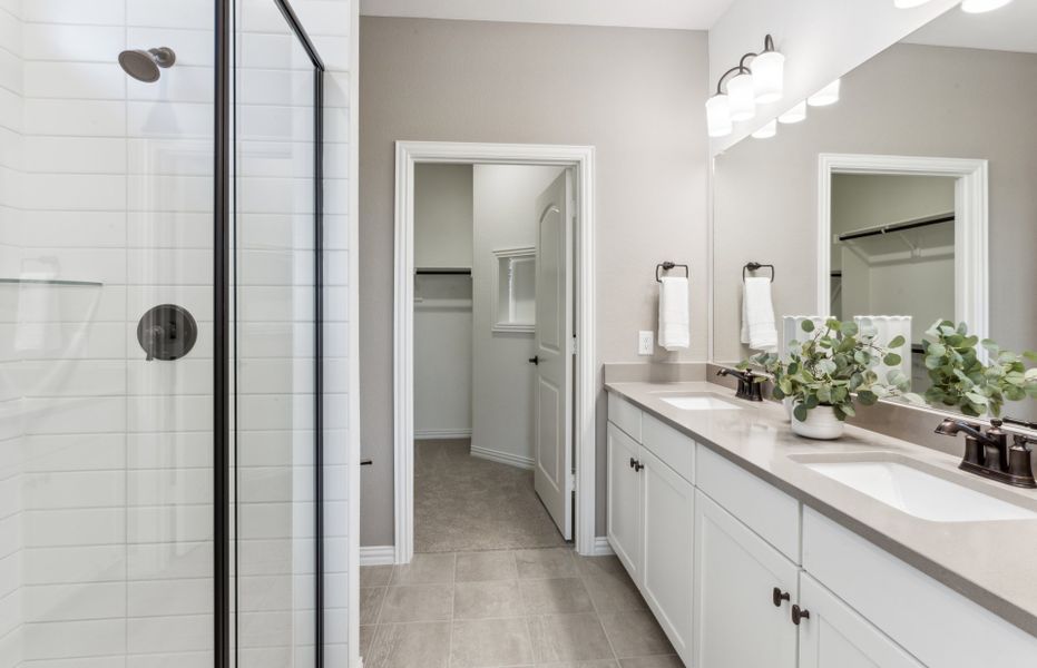 Double vanity in owner's bath