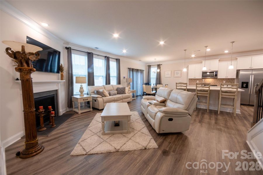 Open living space with a gas fireplace, perfect for relaxing or entertaining.