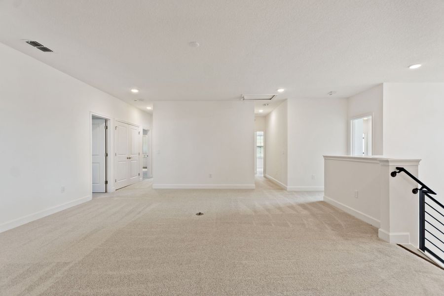 Representative unfurnished interior of a home built from the Oceanside by Park Square Residential in Paradiso Grande, Orlando (Image 25).