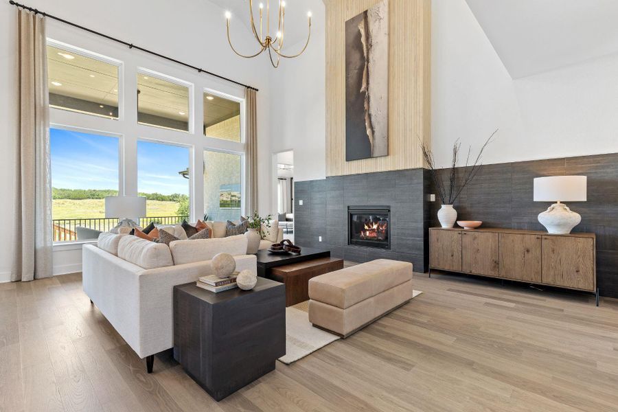 Family Room with soaring ceiling and Fireplace Family Room with soaring ceiling and Fireplace