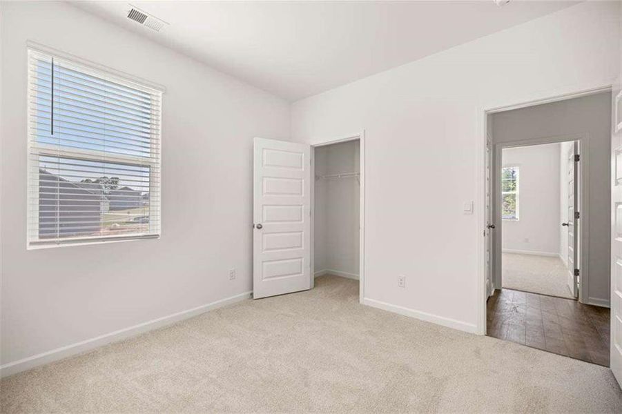 Spacious, unfurnished interior of a new home in Preserve at Dove Creek, Statham (Image 38).