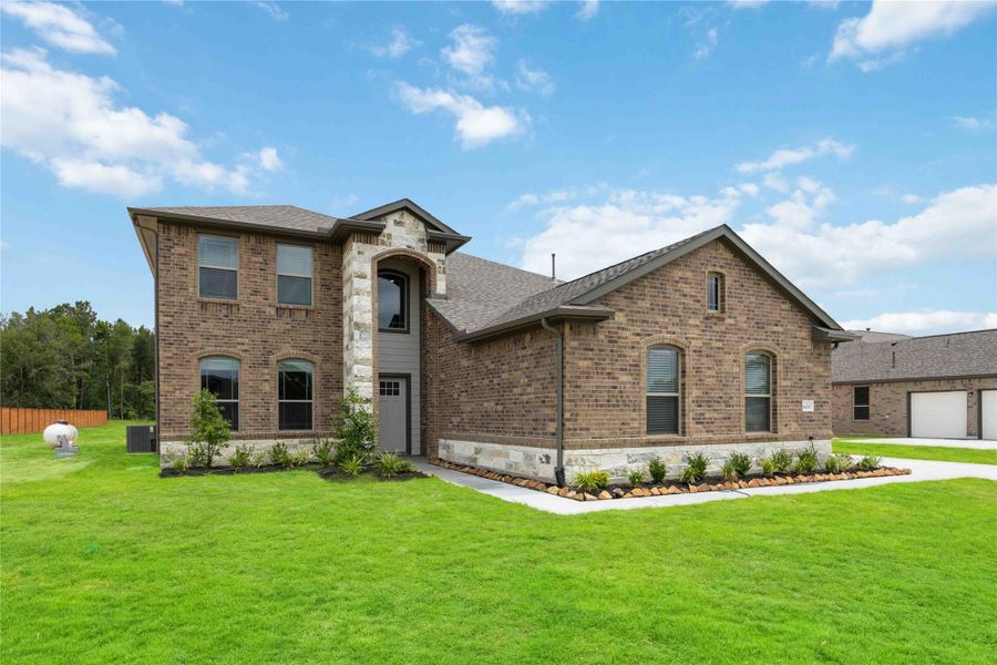 Welcome home to 460 Barton Place Drive in Cleveland, TX.