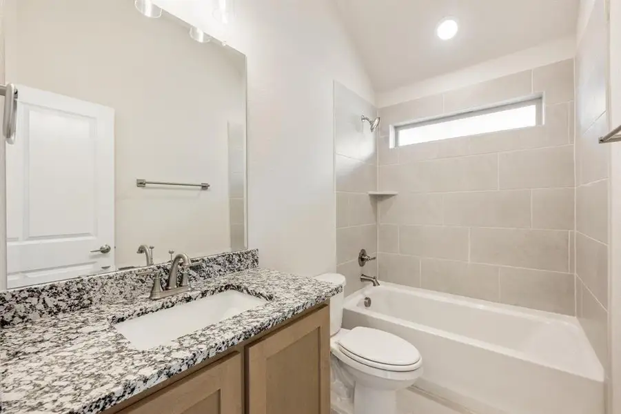 Furnished interior view inside a new home in Waterscape Classic 60s, Royse City (Image 9).