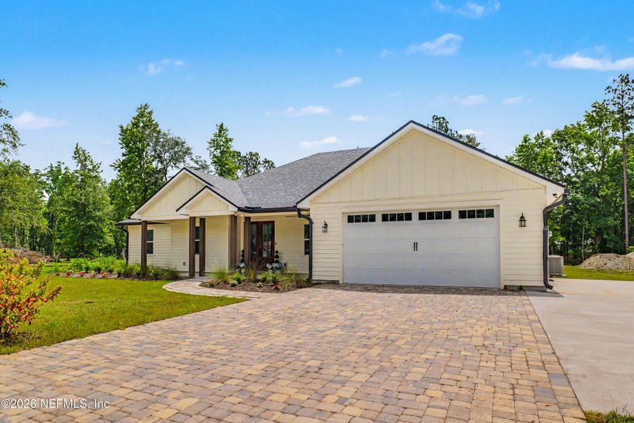 Front exterior of a new home in , Callahan, FL, highlighting curb appeal (Image 24).